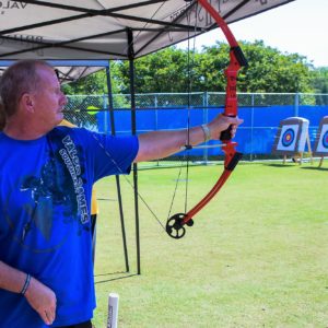 Valor Games Southeast Athlete using mouth tab to pull back bow