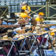 group picture of several people with disabilities shooting air rifle