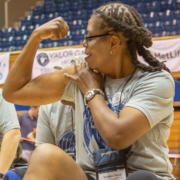 Female Veteran flexing bicep at Valor Games Southeast 2019