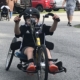 young boy in handcycle